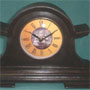 Small chimneyclock, Roman figures, antique look